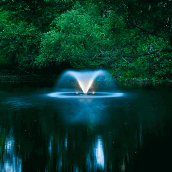 SCOTT AERATOR DA-20 1/2 HP Solar Display Aerator - On Water with Led Light with Trees at the Background