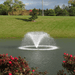 SCOTT AERATOR North Star Fountain Aerator - On Water Diisplay with Green Grass and Trees at the Background