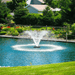 Scott Aerator DA-20 Display Aerator - On a Blue Water with Houses at the Background
